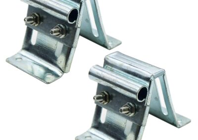 Garage door top bracket for securing rollers and tracks
